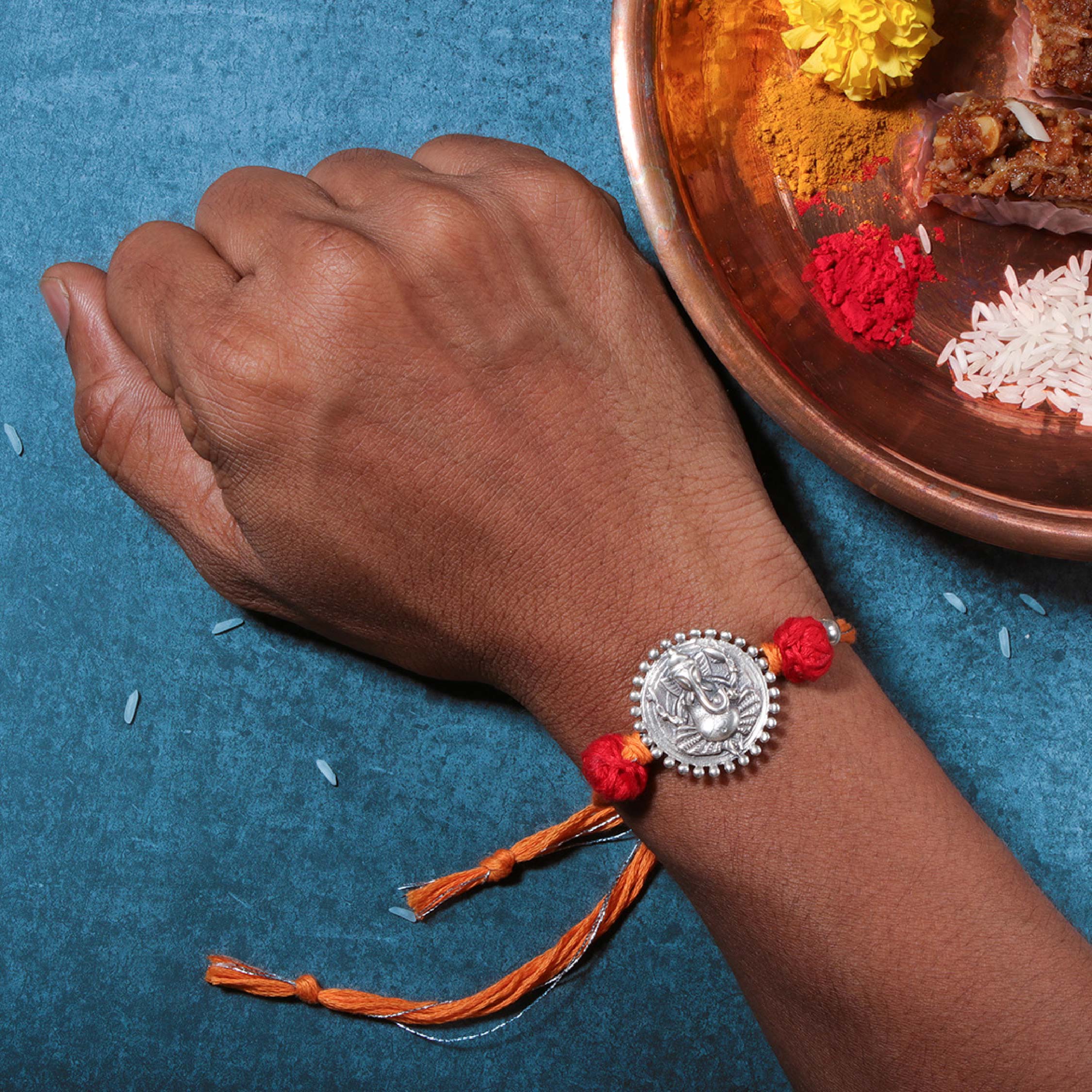 ganesha silver rakhi by moha