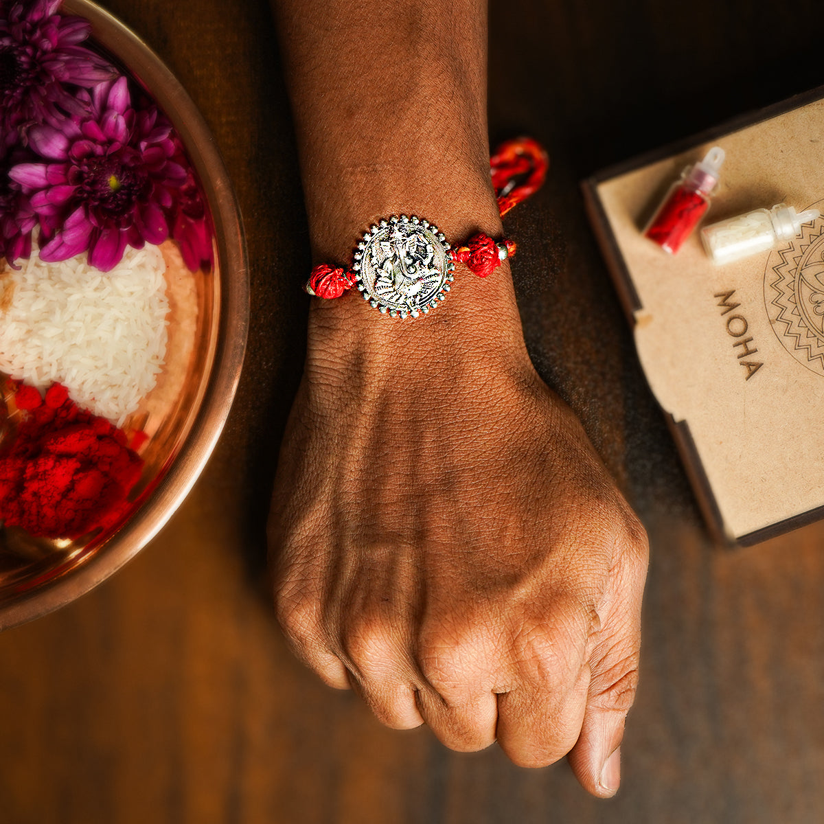 ganesha silver rakhi by moha