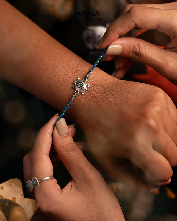 Kurma Silver Rakhi by Moha