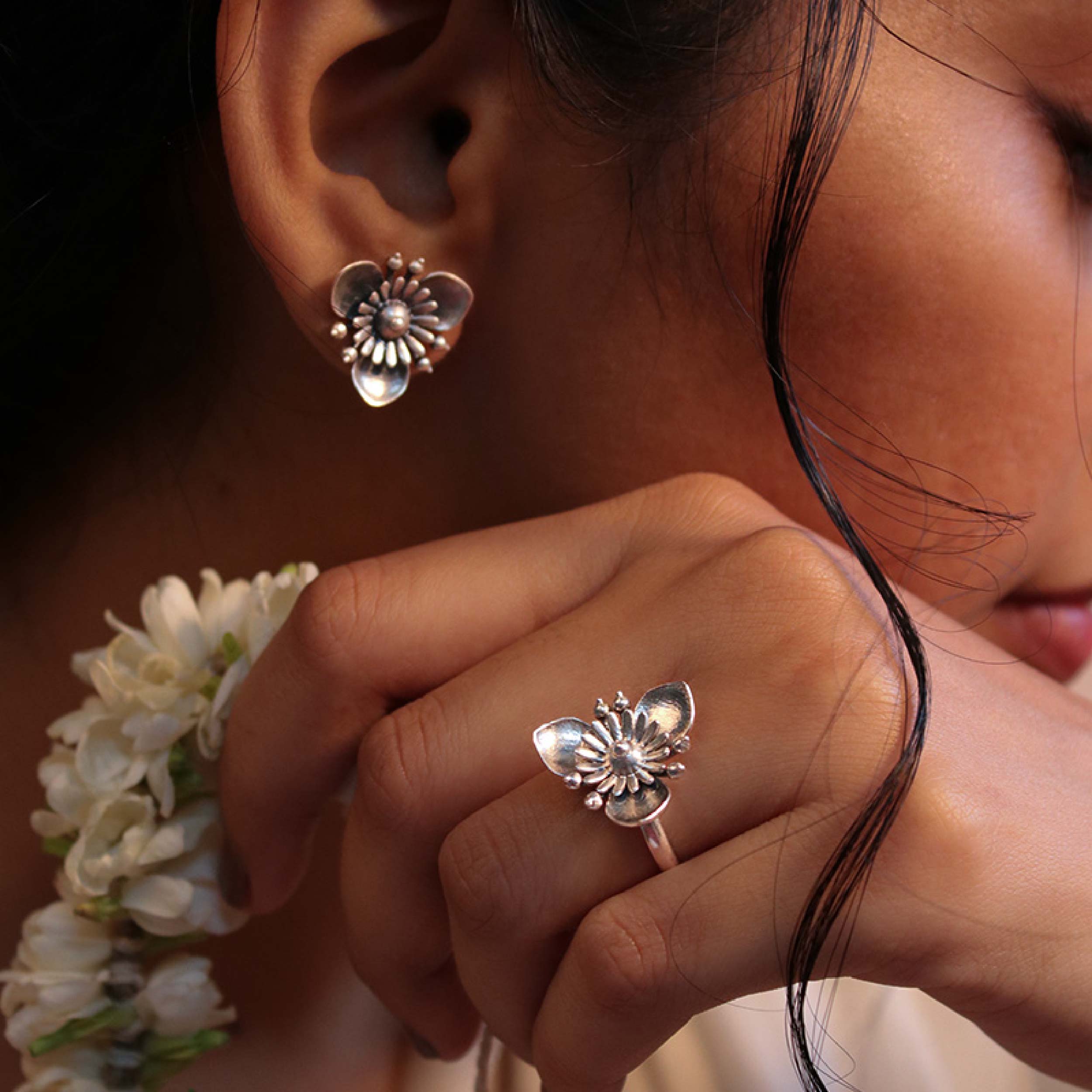 Triloki Silver Earrings
