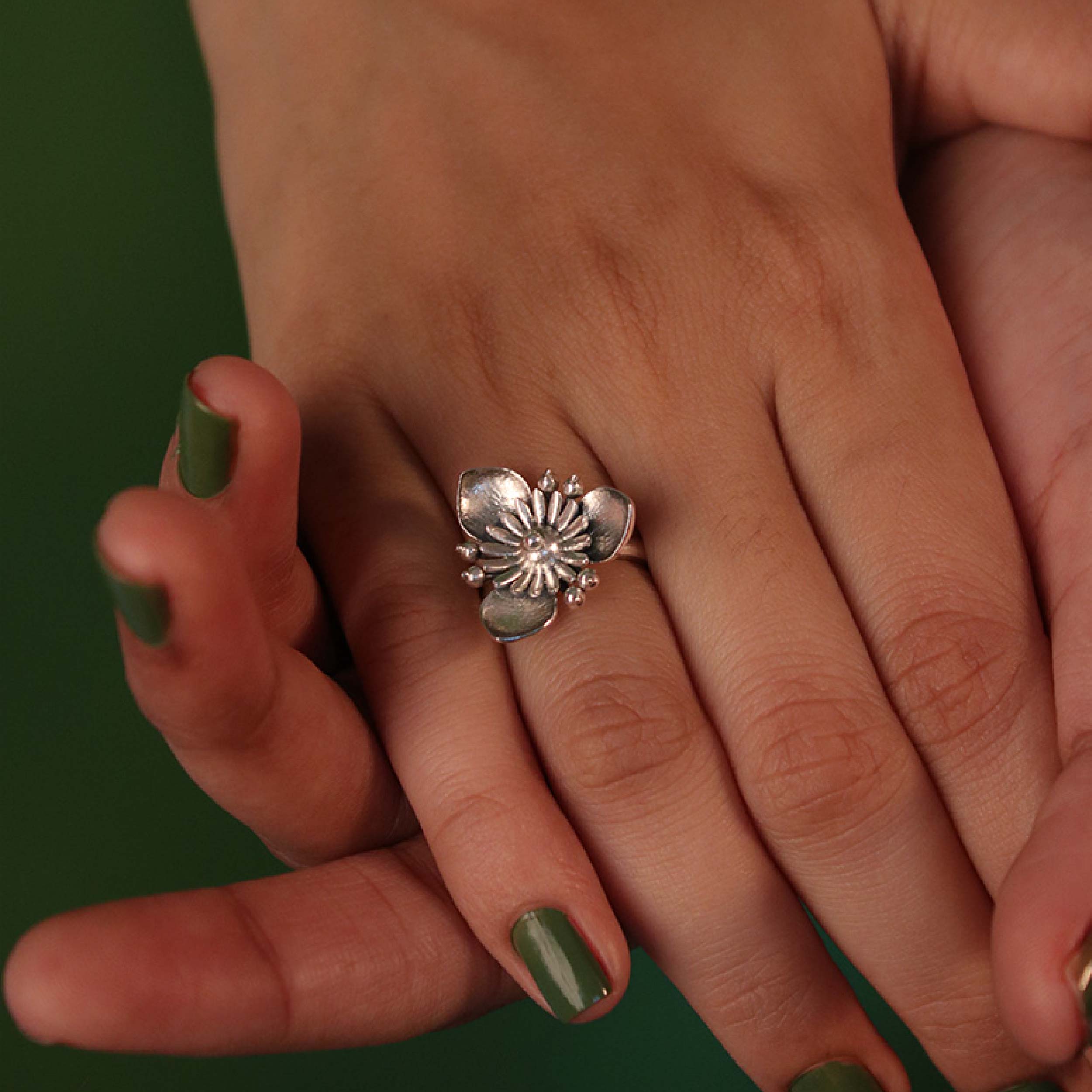 Triloki Silver finger ring