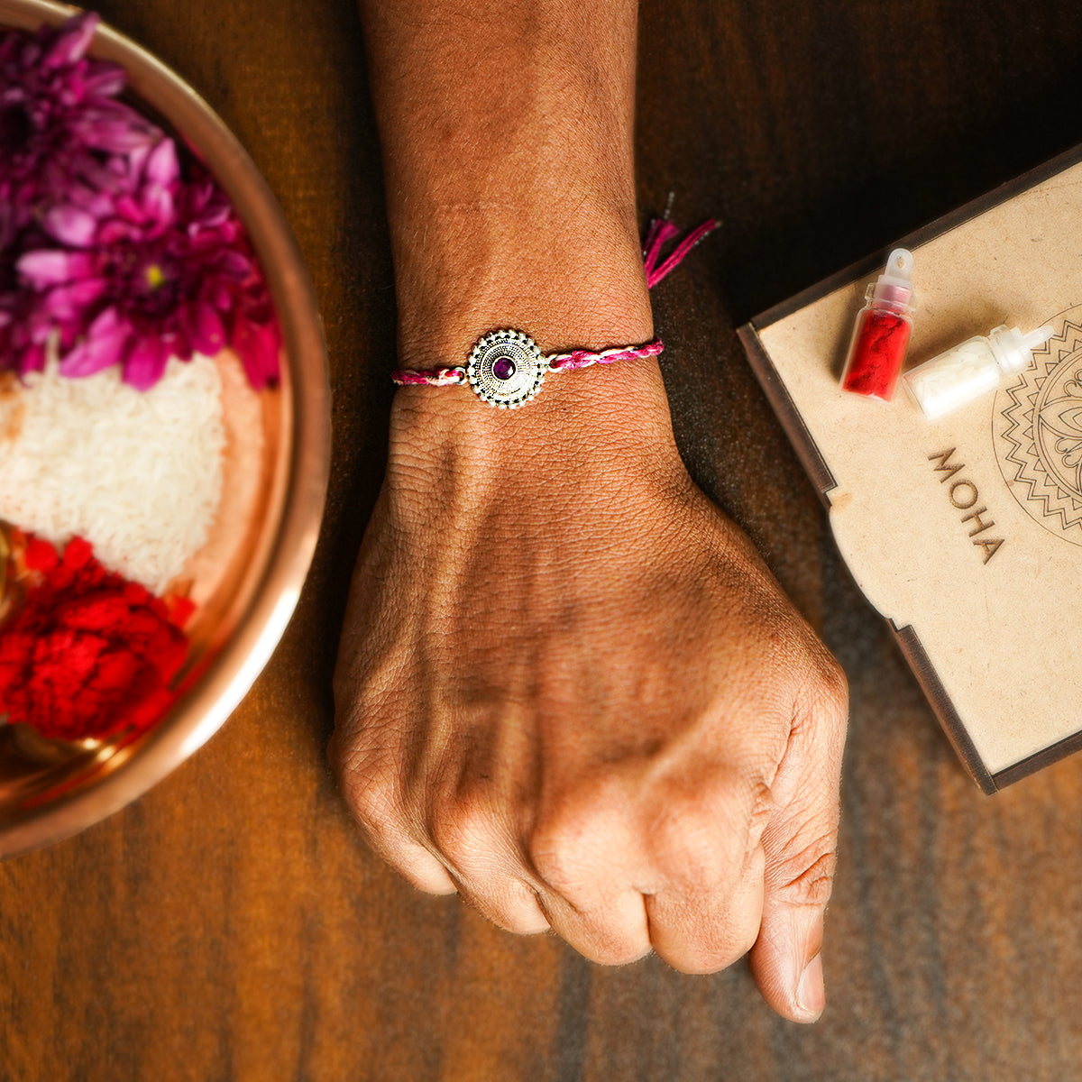 abha silver rakhi by moha