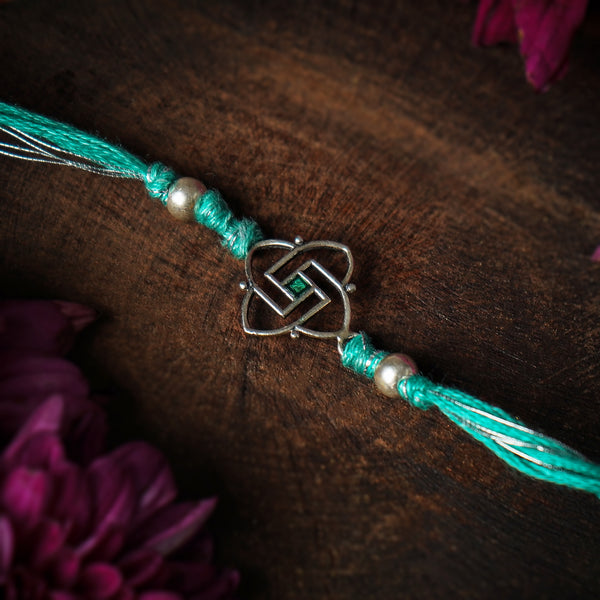 Swastik Silver Rakhi by Moha