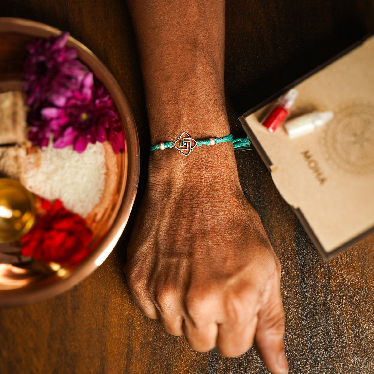 swastik silver rakhi by moha
